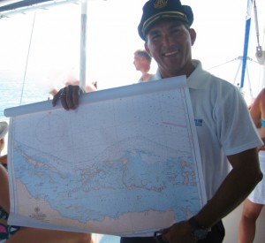 The skipper plots the course for sailing in Cuba, by Yvonne Gordon